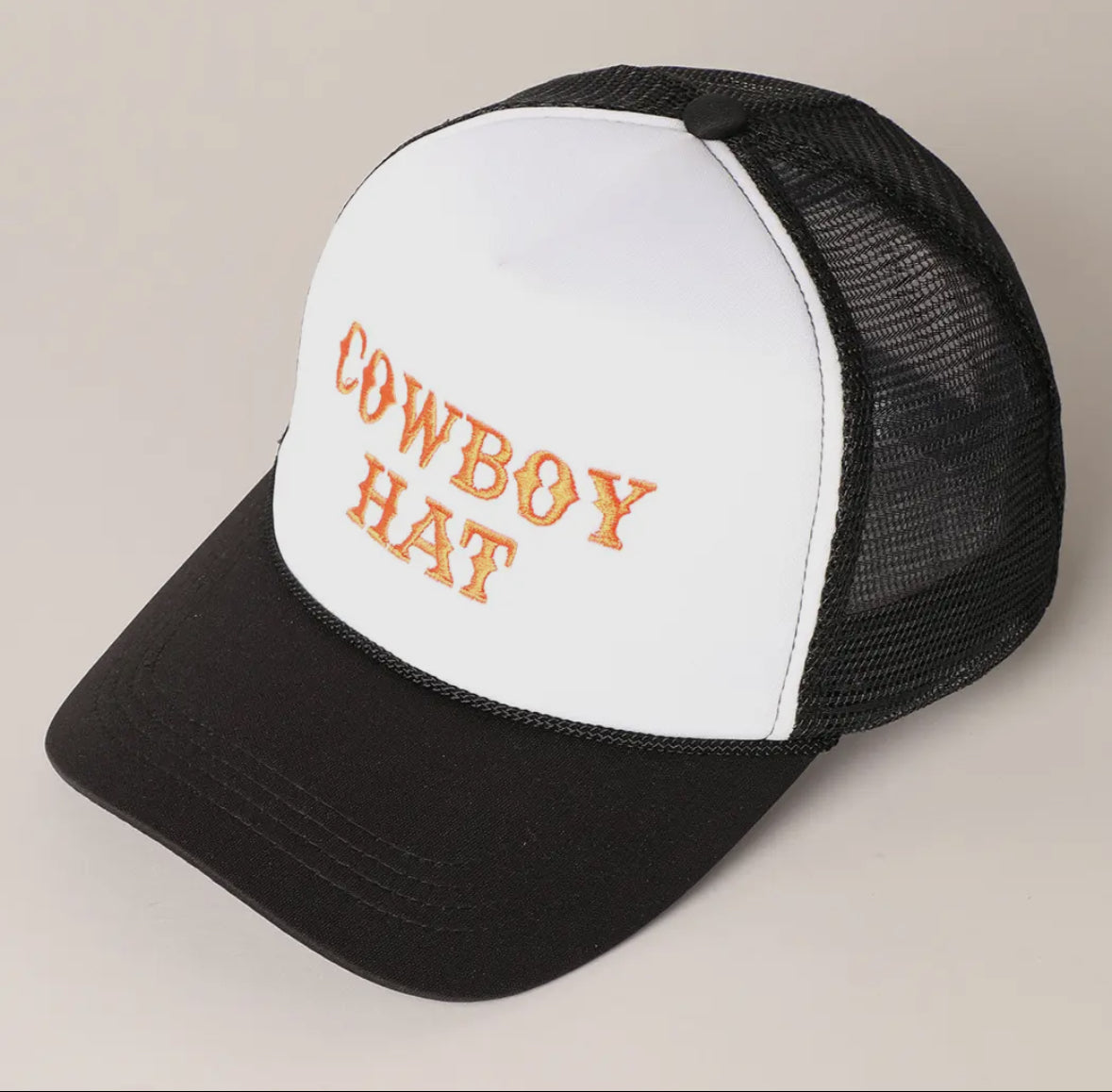 Black and white hat that says " Cowboy Hat"