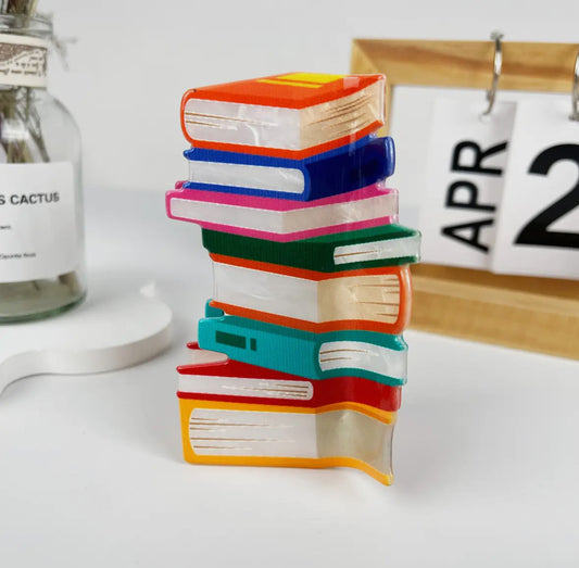 A claw clip that looks like a stack of books